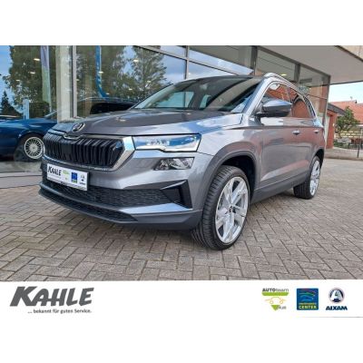 Skoda Karoq 1.5l TSI DSG Premium Teilleder 5J.-Garant.